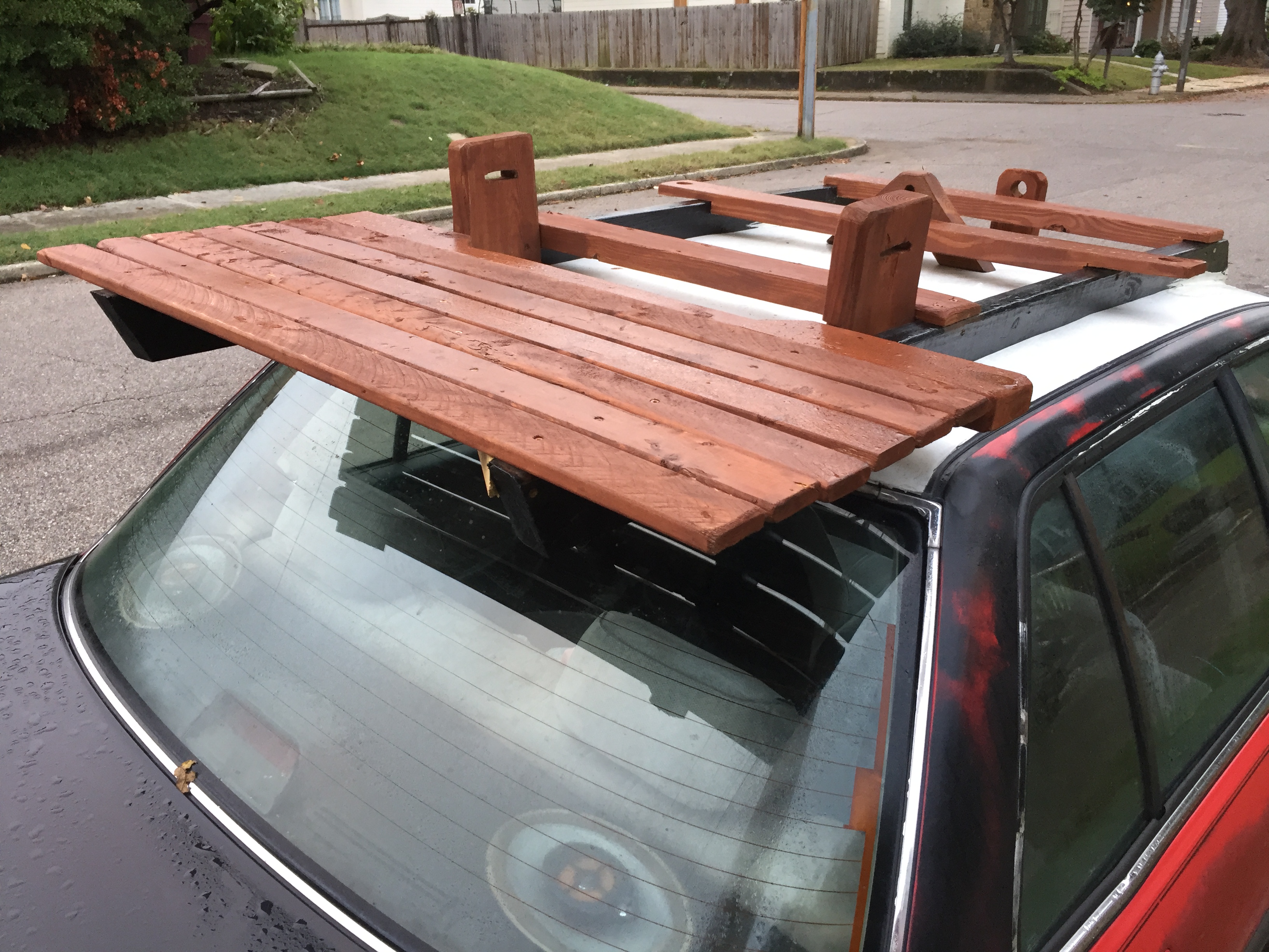 Honda Civic with wooden rack on the roof