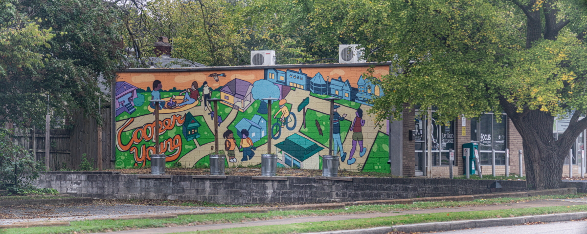  mural on the side of a one-story building 