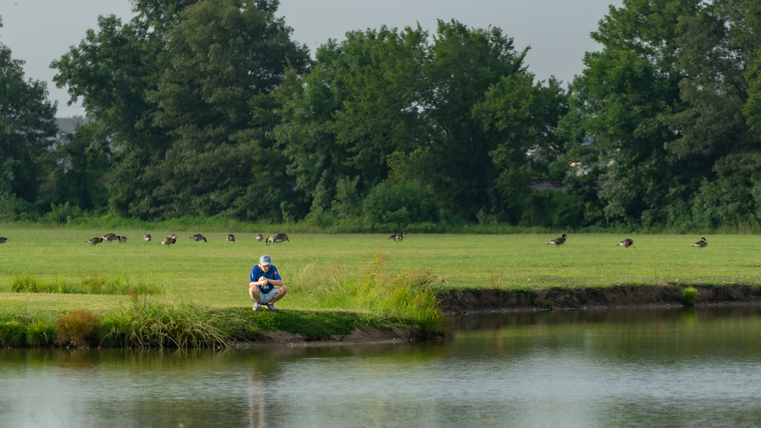  a man fishing alone 