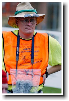 Tim Wheat covering the Free Our People March, photo by Tom Olin. 