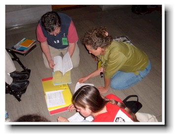 Protestors work on the floor.
