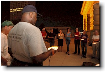 The candlelight vigil outside the building.