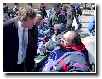 Hary Caulder of Memphis speaks with the acting head of the HHS in March of 2004.